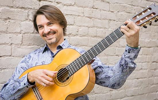 Berto Sales performing at OystoberFest